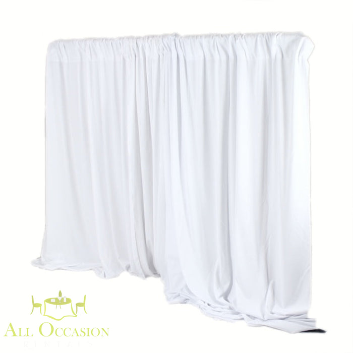 10' High White Pipe & Drape Rental displayed as an elegant backdrop for events and celebrations.