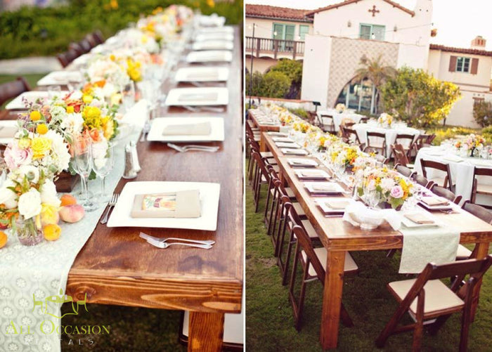 Elegant farm table setup with flowers for event rentals in Corona, ideal for weddings and receptions.