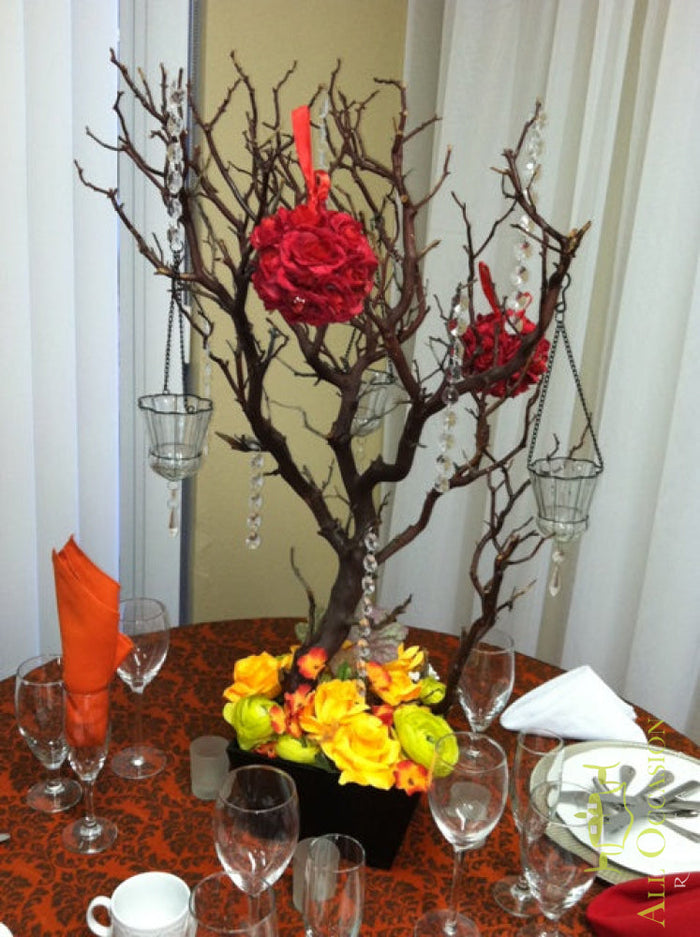 Floral Centerpiece Rental Design 38 featuring elegant floral arrangement and decorative branches for events.
