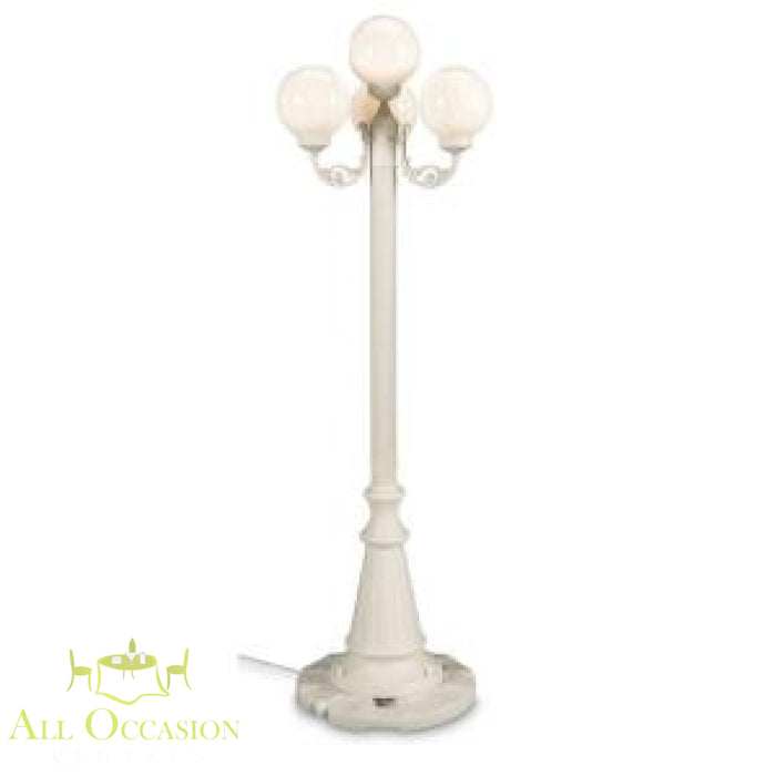 Elegant 8' white lamp post with three globe lights, perfect for outdoor events and Corona party rentals.
