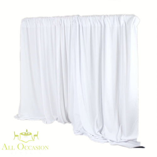 10' High White Pipe & Drape Rental displayed as an elegant backdrop for events and celebrations.