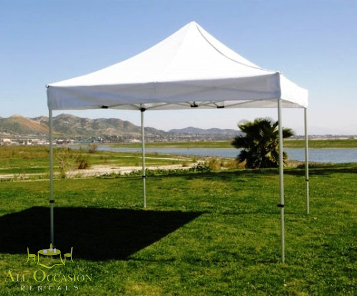 10' x 10' EZ UP pop-up canopy set up in an outdoor event space for shade and protection.