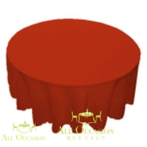 108 Round Polyester Tablecloth Red on a round table, adding elegance to any event setting.