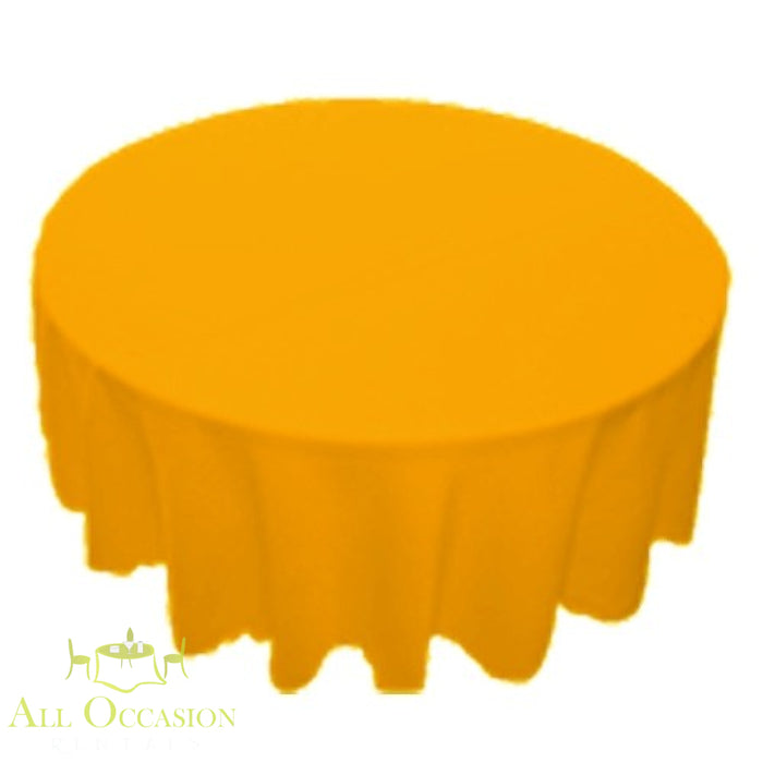 120 inch Round Polyester Tablecloth Gold on a round table, perfect for weddings, events, and restaurants.