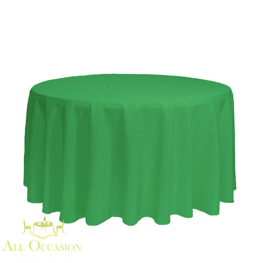 132 Inch Round Polyester Tablecloth Kelly Green displayed on a round table, perfect for elegant events and special occasions.