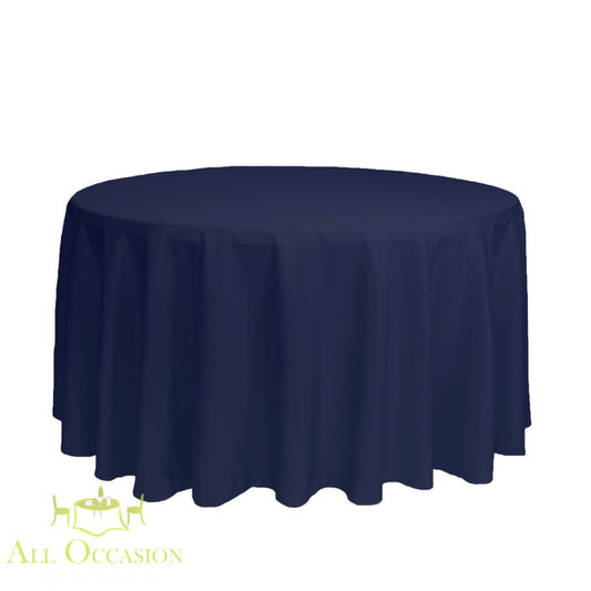 132 Inch Round Polyester Tablecloth Navy Blue displayed on a round table, perfect for elegant events and celebrations.
