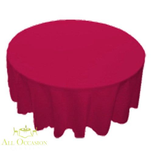 132 Inch Round Polyester Tablecloth Red on a round table, perfect for events and celebrations.