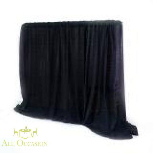 15' High Black Pipe & Drape Rental creating an elegant backdrop for events and stage settings.