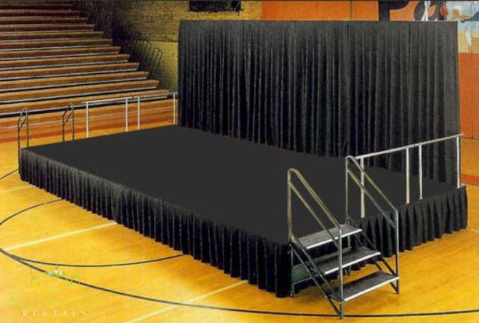 4' X 8' Stage with black skirt and steps, ideal for weddings and corporate events.