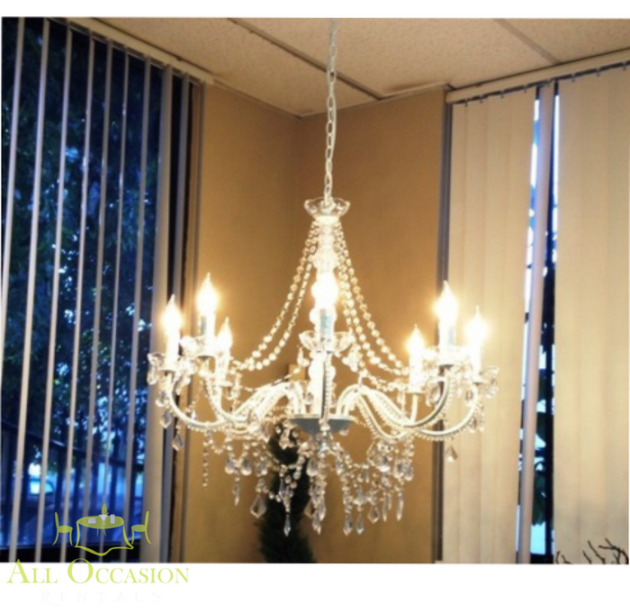 Elegant 8 crystal chandelier lights, perfect for Corona event rentals and wedding accessories rental in Corona.