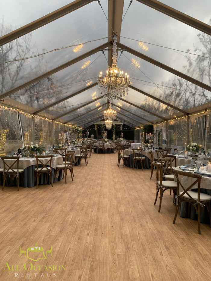 Elegant tent setup with crystal chandeliers, perfect for weddings and events in Corona, CA.
