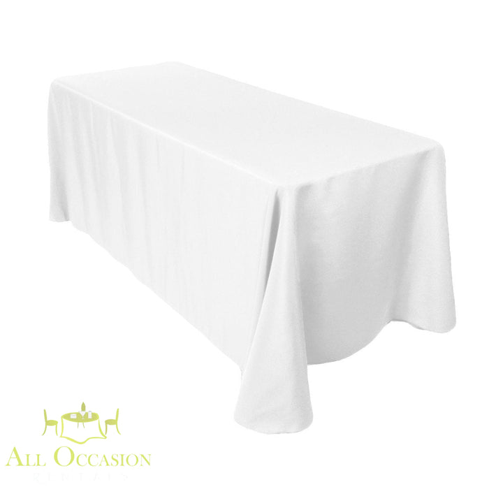8 ft Polyester White Table Drape Rental for weddings and events, providing a polished, professional presentation.