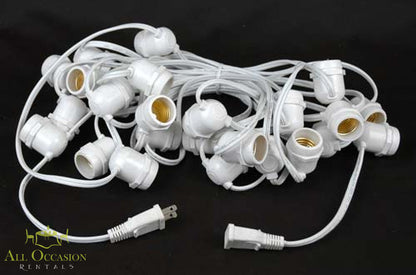 Bistro Lighting Rental 37.5ft white string lights cable and sockets on a black background.