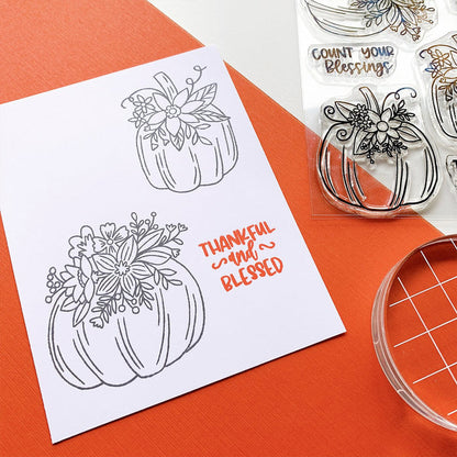 Catherine Pooler - Stamps - Front Porch Pumpkin. If an elegant, farmhouse look is your go-to for Halloween and Fall, then the Front Porch Pumpkins Stamps and Dies are going to be a fav!  These beautiful line art pumpkins are adorned with a variety of flowers and greenery and are ready for Pinterest perfect cards! Available at Embellish Away located in Bowmanville Ontario Canada - Stamped image example
