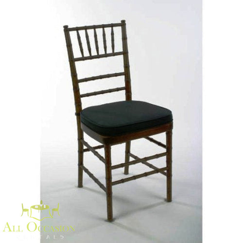 Chiavari chair rental in mahogany with black cushion for events, weddings, and rentals in Corona.