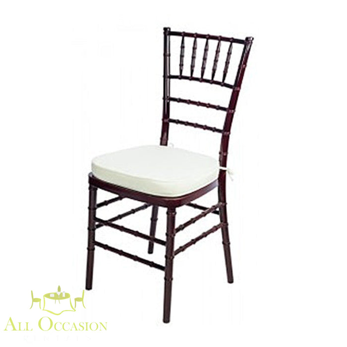 Chiavari chair mahogany with ivory cushion for event rentals in Corona, ideal for weddings and special occasions.