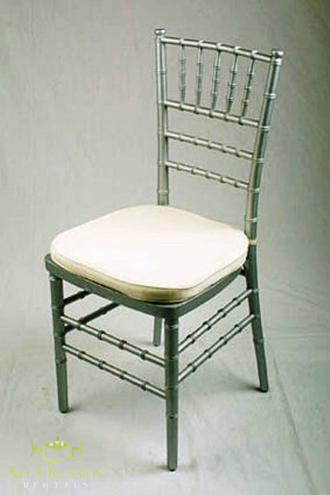 Silver Chiavari chair with ivory cushion for rental, ideal for weddings and events in Corona, CA.