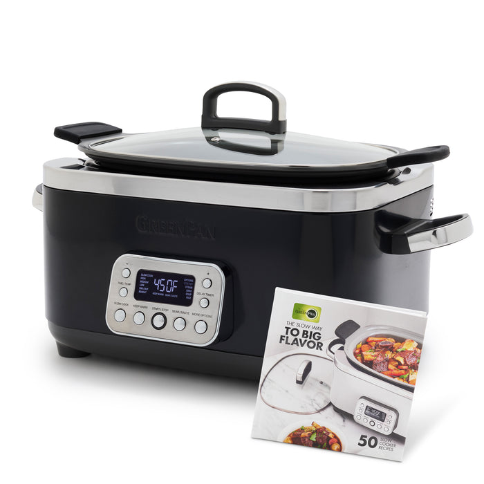 A black Elite 14-in-1 6-Quart Slow Cooker with a digital display sits beside a recipe booklet showing the cooker and a food dish on the cover, highlighting the easy-to-use presets.