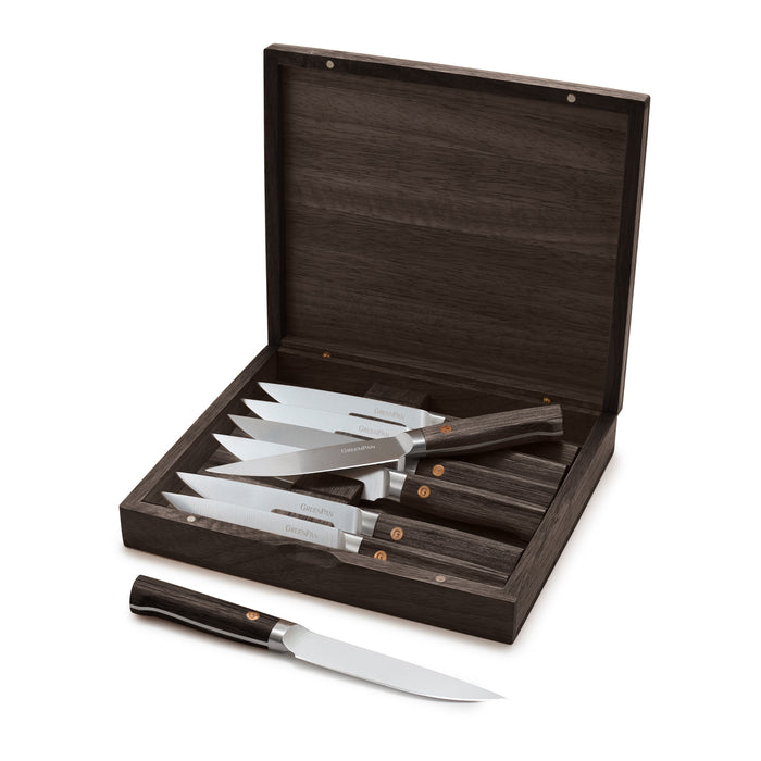 8-piece steak knife set with dark wood handles in an open case, one knife set in front of the box.
