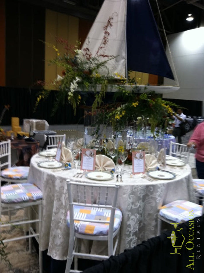 Floral Centerpiece Rental Design 22 showcased on an elegantly set table for an event decor display.