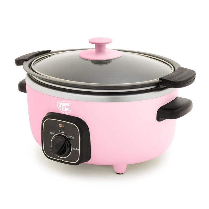 Pink slow cooker with black handle and control panel on a white background