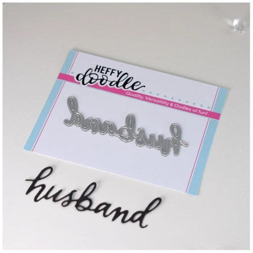 Heffy Doodle - Heffy Cuts Die - Husband. A standalone metal cutting die of the word ‘Husband’ in a hand lettered style. Measuring approximately 3" x 1". Available at Embellish Away located in Bowmanville Ontario Canada.