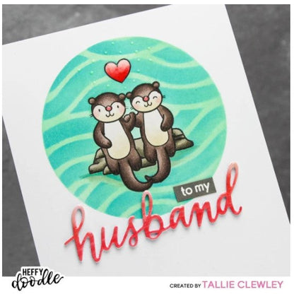 Heffy Doodle - Heffy Cuts Die - Husband. A standalone metal cutting die of the word ‘Husband’ in a hand lettered style. Measuring approximately 3" x 1". Available at Embellish Away located in Bowmanville Ontario Canada. Card example by Tallie Clewley