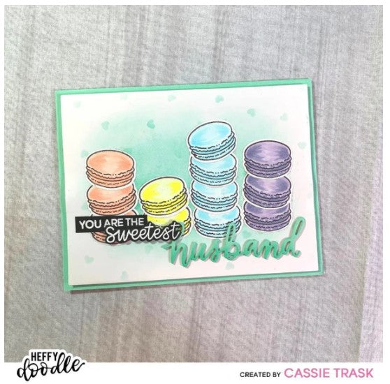 Heffy Doodle - Heffy Cuts Die - Husband. A standalone metal cutting die of the word ‘Husband’ in a hand lettered style. Measuring approximately 3" x 1". Available at Embellish Away located in Bowmanville Ontario Canada. Card example by Cassie Trask.