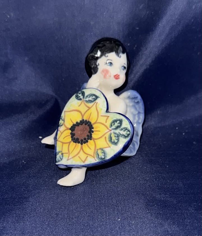 Phoenix Sunflower Sitting Angel with Leg up, holding heart - Pattern: Sunflower