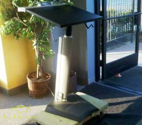 Podium Rental stainless steel with black top positioned in a professional setting for events and speeches.