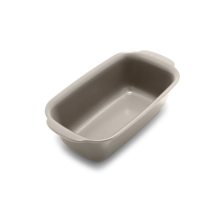 Taupe ceramic nonstick loaf pan with handles, 1 lb. size, displayed on a white background.