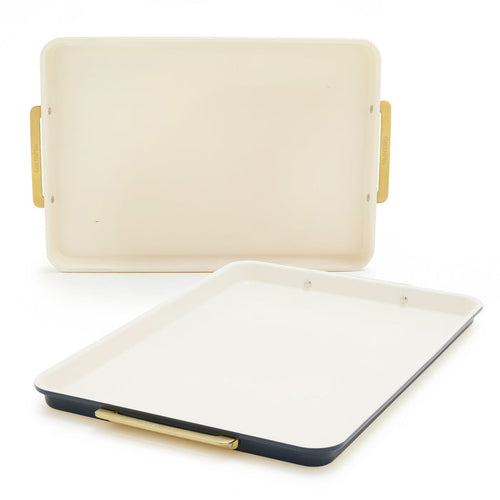 Two twilight blue half sheet pans with gold handles, one standing upright and one flat, on a white background. Set of 2.