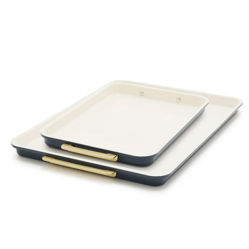 Two-piece sheet pan set in dark blue Twilight color, shown nested together with nonstick finish and smooth edges.