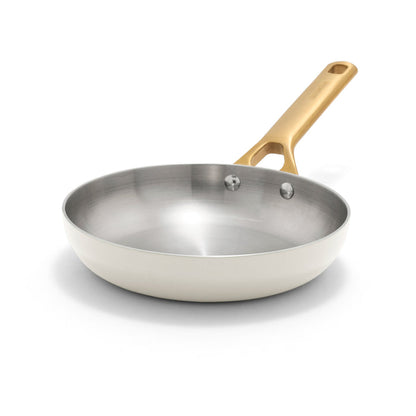 Cream stainless steel 8-inch frypan with a gold handle, shown on a white background.