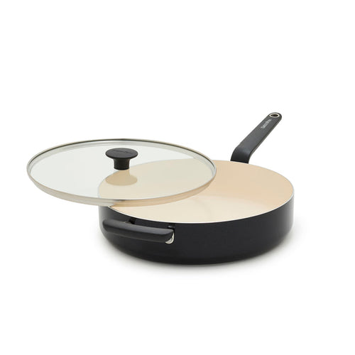 Black ceramic sauté pan with lid, 5-quart size, shown open to display its light-colored interior.