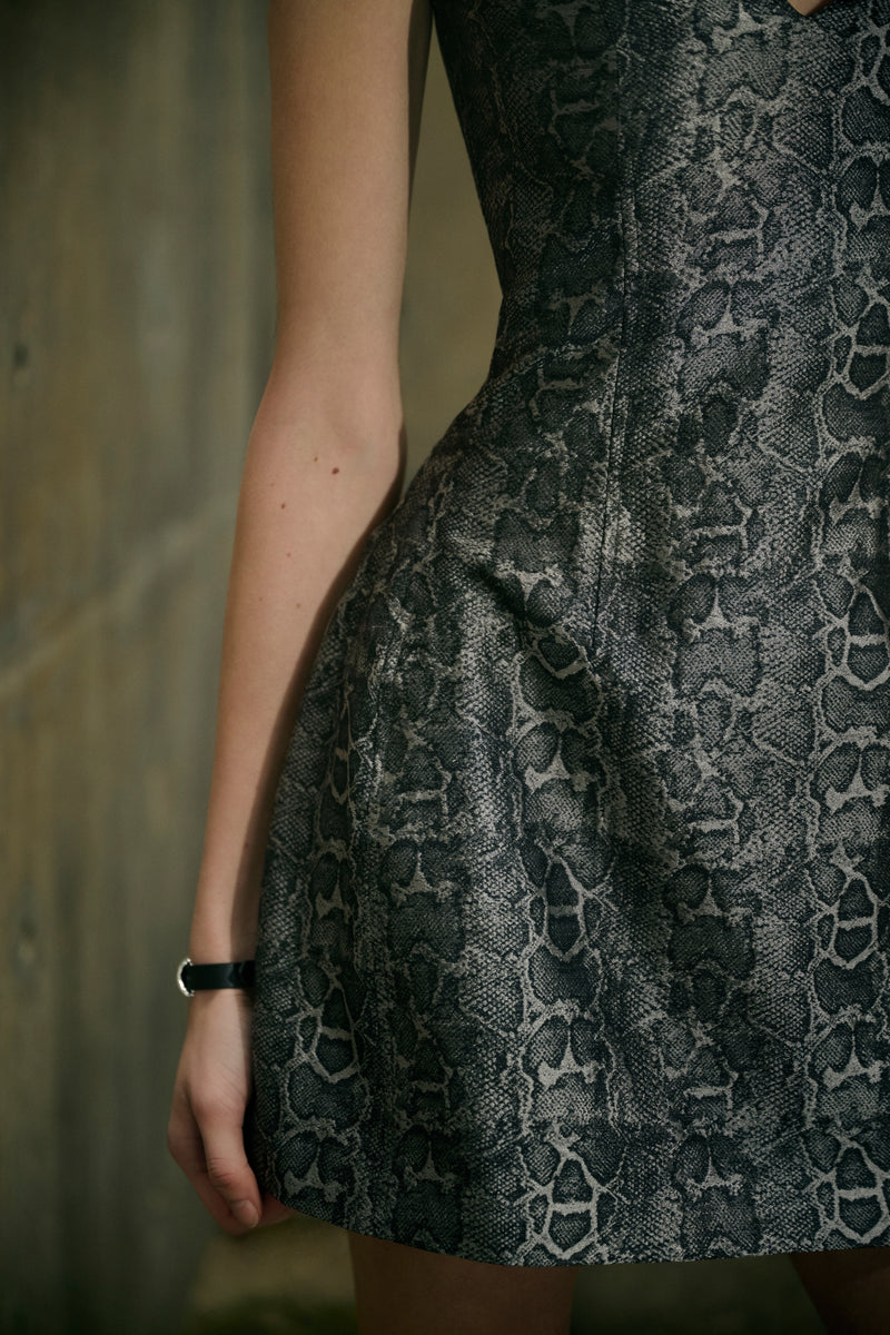 Serpent print off-shoulder dress