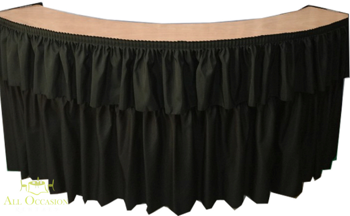 Serpentine Bar with Black Draping rental featuring a sleek curved design and elegant black draping for events.