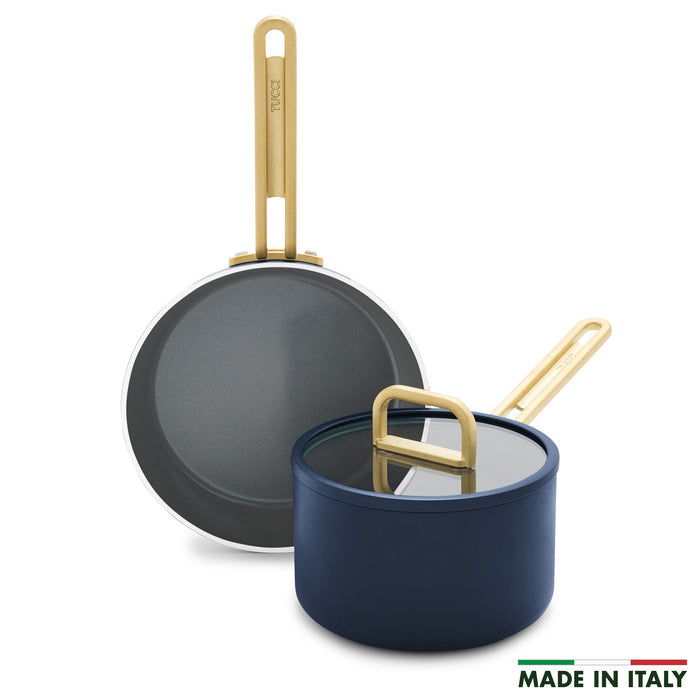 Ceramic nonstick 3-piece mini cookware set in marino blue with gold handles.