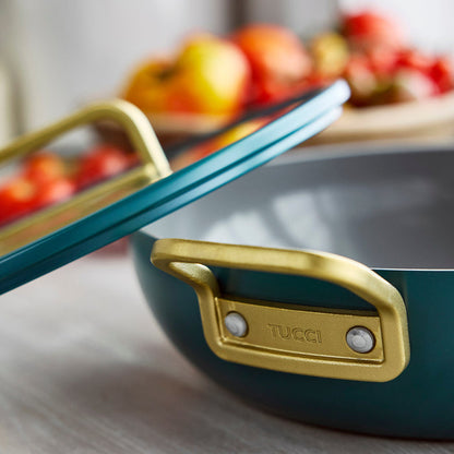 Venetian Teal 4.5-quart pan with a gold handle, shown close up.