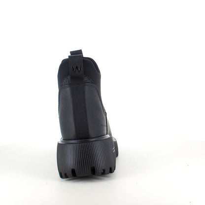 Svart WODEN Isabella Waterproof – stövel i gummi med stötdämpande komfort