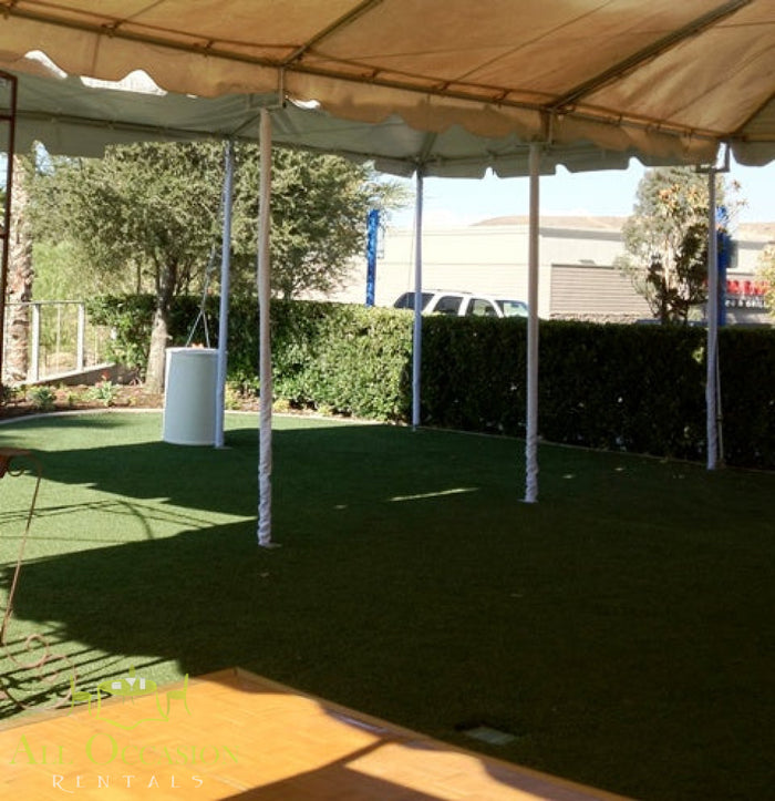 Tent Leg Covers White 8' installed in an outdoor event space with elegant poles and green lawn.