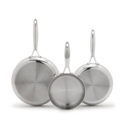 Three stainless steel frypans in 8, 9.5, and 11 sizes overlapping upright on a white background.