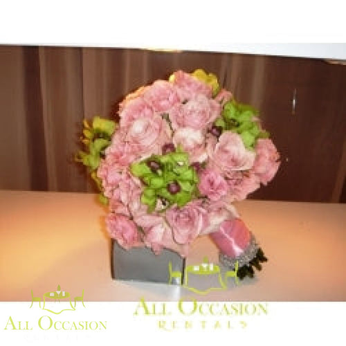 Wedding Bouquet Rental Design 69 featuring elegant pink roses and greenery in a stylish arrangement for brides.